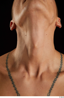 Claudio  2 flexing front view neck 0001.jpg